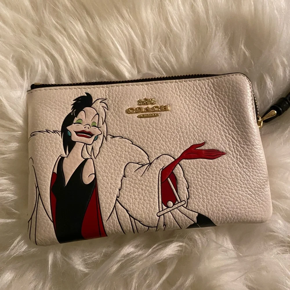 Coach Disney X Coach Corner Zip Wristlet With Cruella Motif